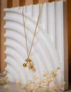 Cadena Box + Dije Cherry Dorada - Mujer
